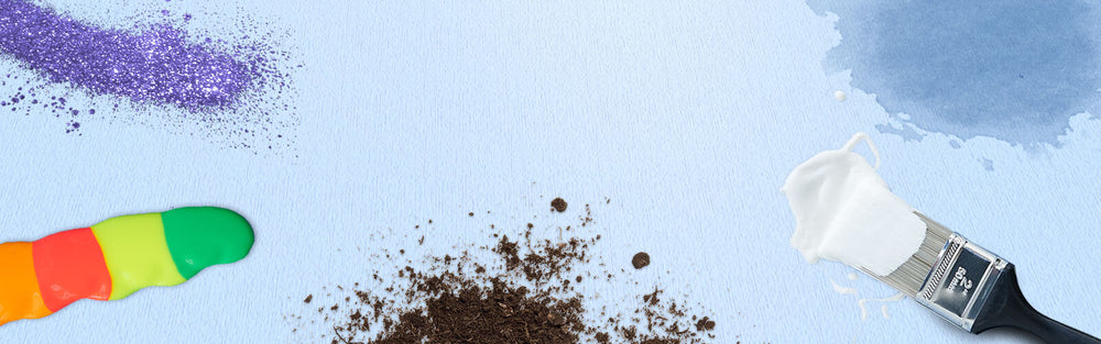 glitter, dirt, and paints spilled on a surface protected by Katch surface protection roll