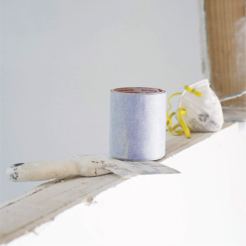 4" x 15' painting tape roll on a ledge