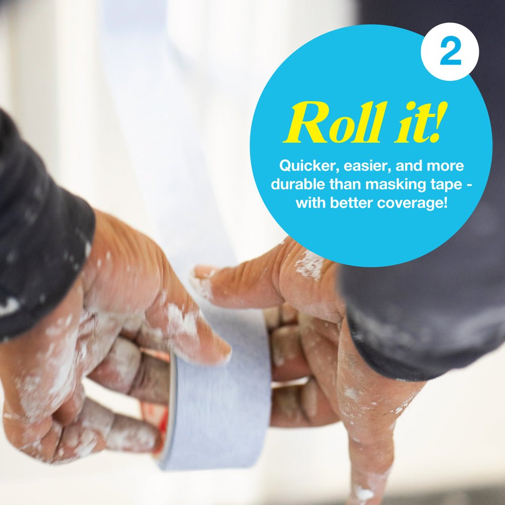 hands holding 1" x 50' painting tape roll