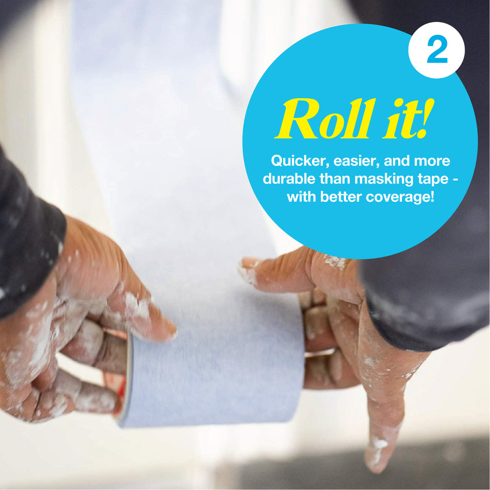 hands holding 4" x 15' painting tape roll